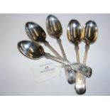 A set of five silver teaspoons with engraved decor
