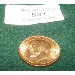 A 1914 gold sovereign coin