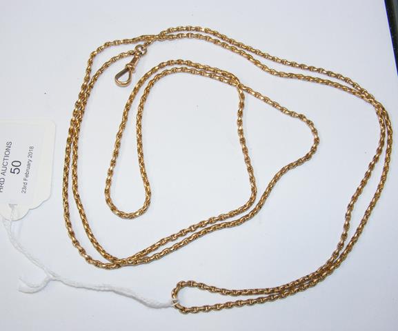 A 15ct gold long watch chain - 33g