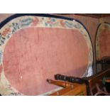 Pair of Chinese style oval rugs