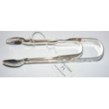 Pair of silver sugar tongs, together with one othe