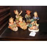 Six Hummel figures