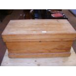 A small antique pine blanket chest