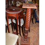 Two tier plant stand, together with a torchere sta