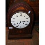 A 45cm high inlaid Edwardian "Lancet" mantel clock