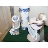 A Lladro Eskimo and Polar Bear, together with Nao