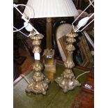 Pair of decorative cast French brass table lamps,