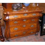 An antique Dutch marquetry bombe chest with oak ca