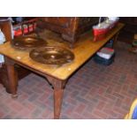 A long antique dining table on turned supports - 245cm