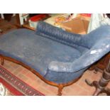 An antique chaise longue on cabriole supports