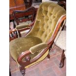 A 19th century button back library chair with scro