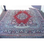 Middle Eastern style carpet with geometric border