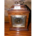 A Pressley & Son walnut cased mantel clock