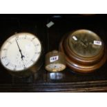 An oak circular wall clock, together with two othe