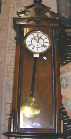 A Vienna style regulator wall clock, with separate