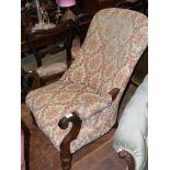 A William IV button back easy chair