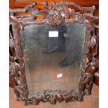 Carved Black Forest wall mirror - 58cm x 44cm