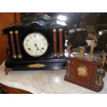 An antique mantel clock and one other