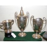 A two handled silver trophy for pigeon racing with