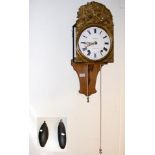 A French comptoise clock with striking movement