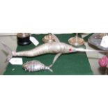 A 10cm long white metal articulated fish spice hol