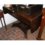 A 19th century rosewood sofa table with two drawer