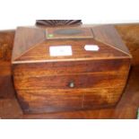 A Victorian casket shaped tea caddy