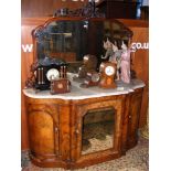 A Victorian walnut sideboard with mirrored back an
