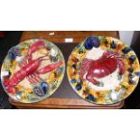 A pair of majolica crab and lobster chargers - 31c