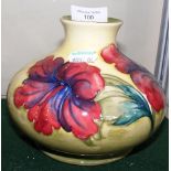 A Moorcroft pottery vase with tube line floral dec