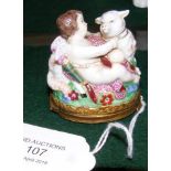 A Meissen pill box cover - winged cherub and sheep