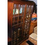 An antique two door bookcase