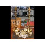 Pair of decorative brass candlesticks, together wi