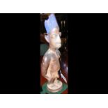 An old carved Nigerian Yoruba figure with blue hai