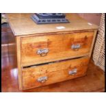 An oak two drawer chest