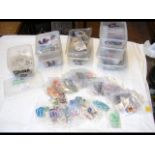 Ten plastic tubs containing collectable stamps fro