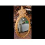 Decorative gilt framed wall mirror