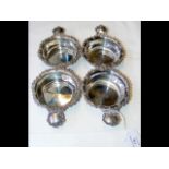 Set of four decorative sterling silver wine taster