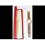 A gent's 9ct gold Omega De Ville wrist watch with