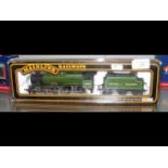 A boxed Mainline Locomotive and Tender