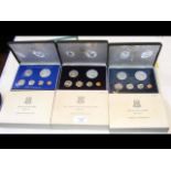 Three part silver cased coin sets