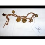 A 9ct gold charm bracelet, including a 1910 half s