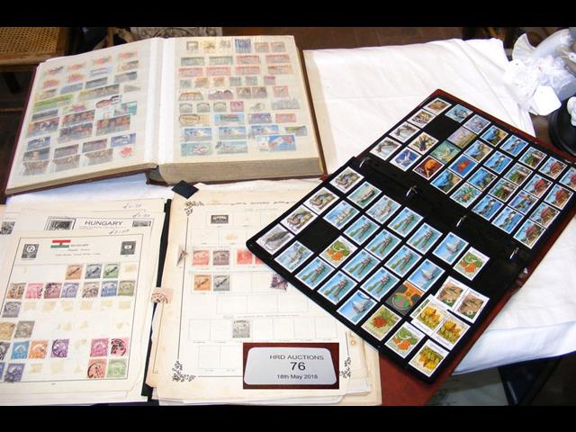 Album containing collectable stamps from around th