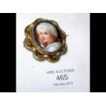 A miniature of a lady on ivory, made into brooch