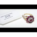 An 18ct gold ruby and diamond ring