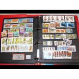 A stamp album with a large quantity of stamps rela