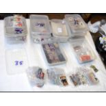Selection of plastic tubs containing collectable s