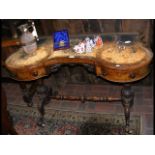 A Victorian walnut lady's writing desk with brass