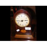 A 23cm high Edwardian lancet shaped mantel clock