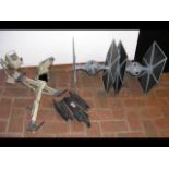 Two vintage Tie Fighters, together with a Winged F